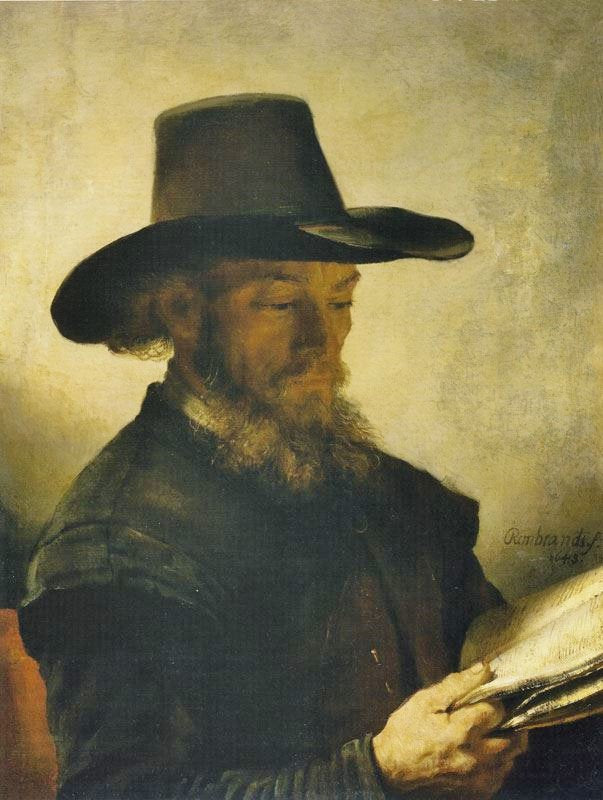 Portrait Of A Man Reading by Rembrandt van Rijn
