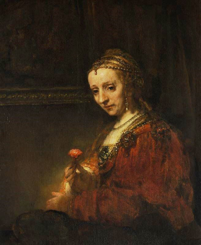 Woman With A Pink by Rembrandt van Rijn