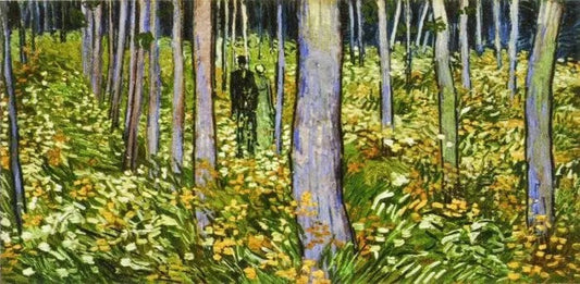 COUPLE WALKING BETWEEN ROWS OF TREES