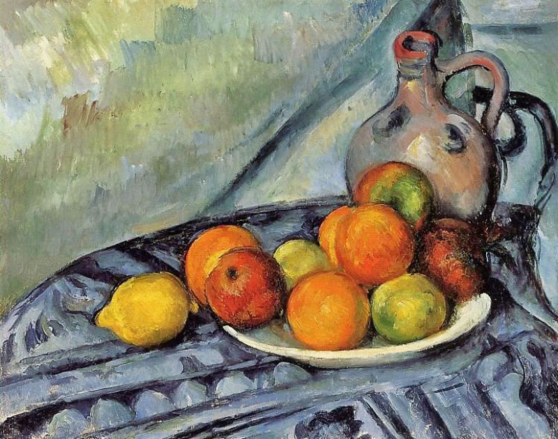 FRUIT AND JUG ON A TABLE