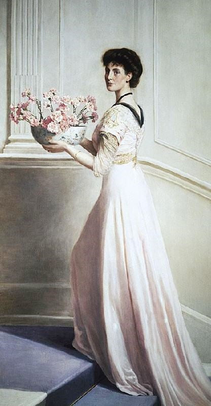Lady With A Bowl Of Pink Carnations by John Maler Collier