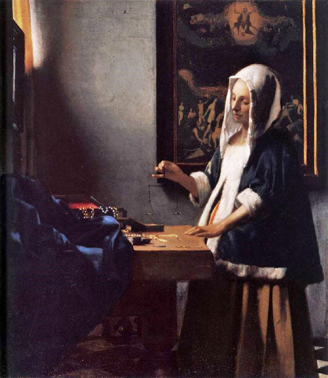 Woman Holding A Balance by Johannes Vermeer