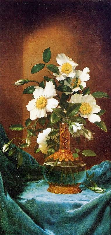 WHITE CHEROKEE ROSES IN A SALAMANDER VASE