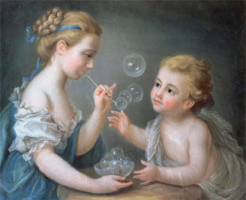 CHILDREN BLOWING BUBBLES