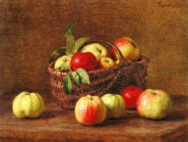 APPLES IN A BASKET AND ON THE TABLE