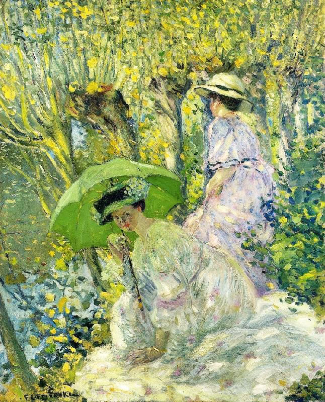 TWO YOUNG WOMEN IN A GARDEN