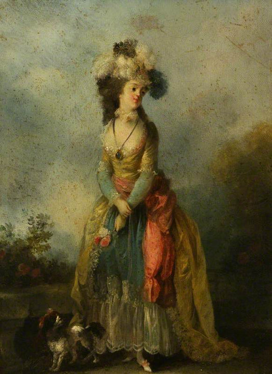 A LADY WALKING WITH A KING CHARLES SPANIEL