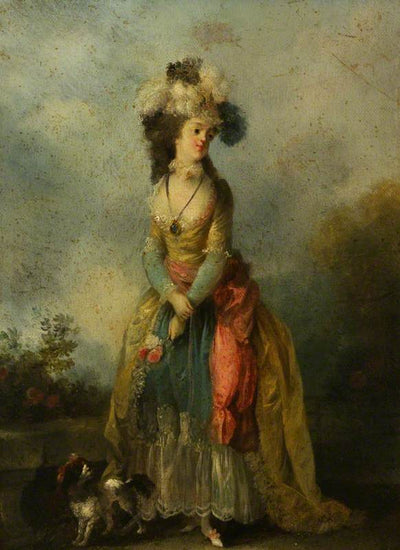 A LADY WALKING WITH A KING CHARLES SPANIEL