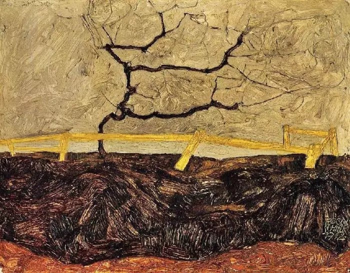 BARE TREE BEHIND A FENCE