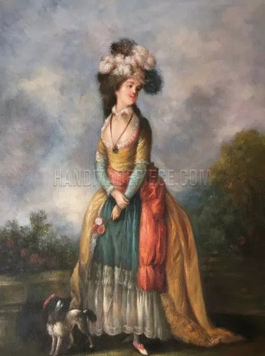 A LADY WALKING WITH A KING CHARLES SPANIEL