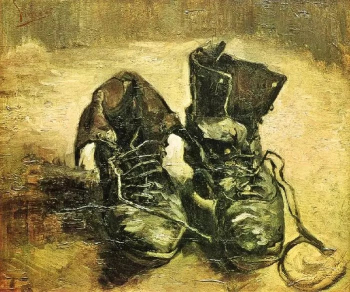 A PAIR OF SHOES