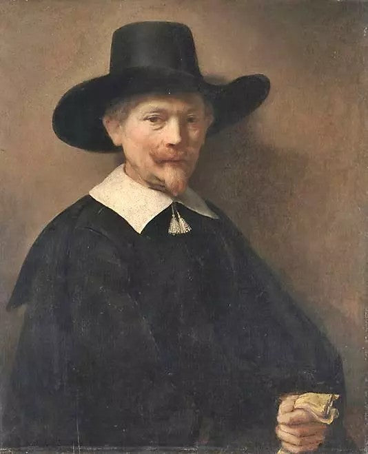 PORTRAIT OF A MAN HOLDING GLOVES