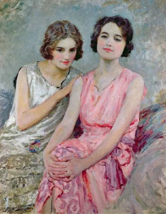 TWO YOUNG WOMEN SEATED